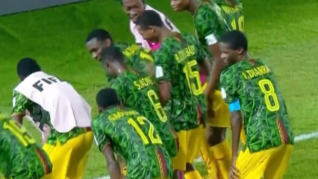 Mali players pictured dancing after scoring a goal in a 3-0 win over Argentina at the U17 World Cup in December 2023